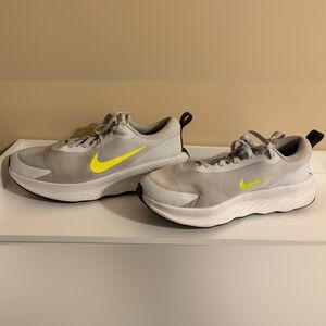 Nike Light Gray Sneakers with Neon Yellow Swoosh